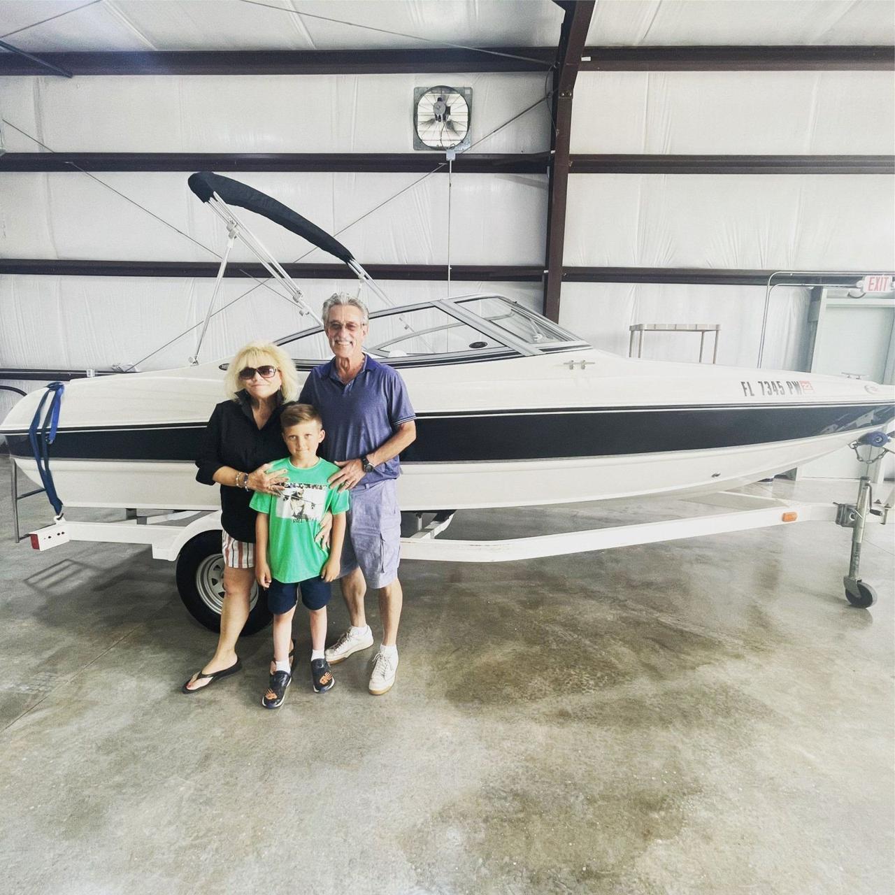 Happy customers with their boat