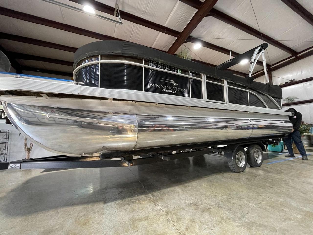 Pontoon boat detailed inside the Sailaway Bay shop